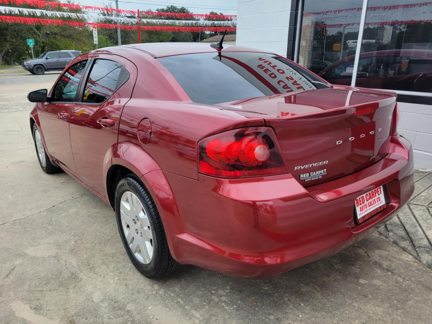 2014 Red Dodge Avenger SE (1C3CDZAB1EN) with an 2.4L L4 DOHC 16V engine, 4-Speed Automatic transmission, located at 503 West Court, Seguin, TX, 78155, (830) 379-3373, 29.568621, -97.969803 - 2014 Dodge Avenger SE with a 2.4L L4 DOHC 16V, Automatic, Tilt, Cruise, AM/FM/CD/AUX Stereo, Power Windows, Locks and Side Mirrors, Tinted Windows, Rear Defroster and more!! - Photo#3